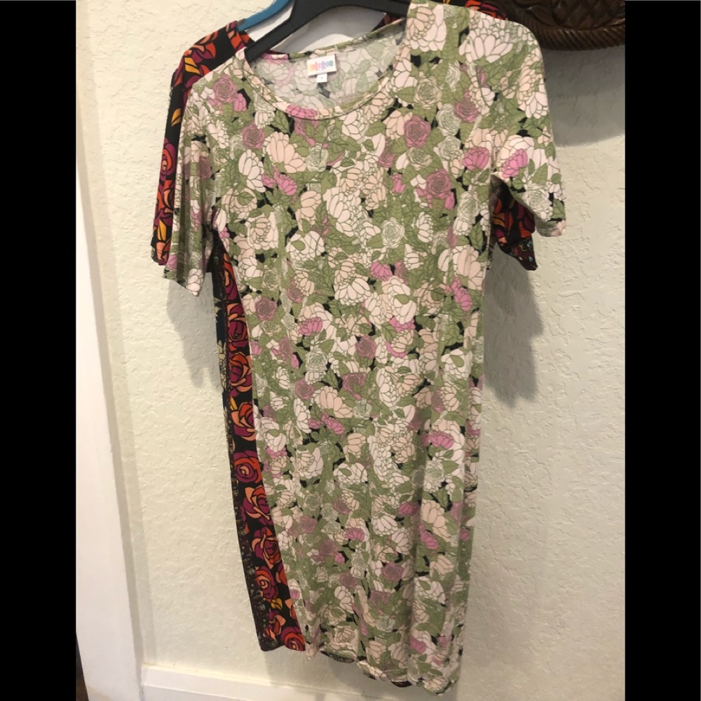 A bundle of 5 Lularoe Julia dresses.